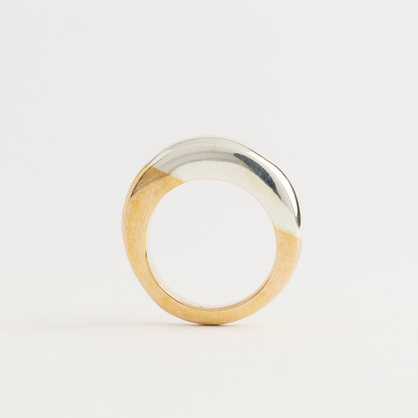 half silver and half bronze ring by ester studio photo by stefania meli